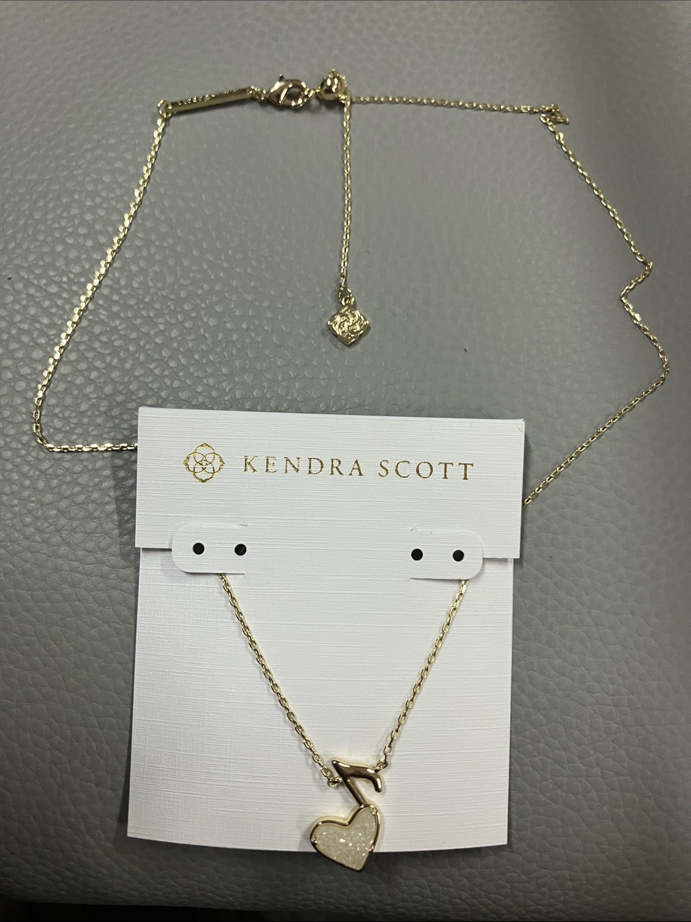 Kendra Scott Gold Heart Necklace with Musical Note Charm